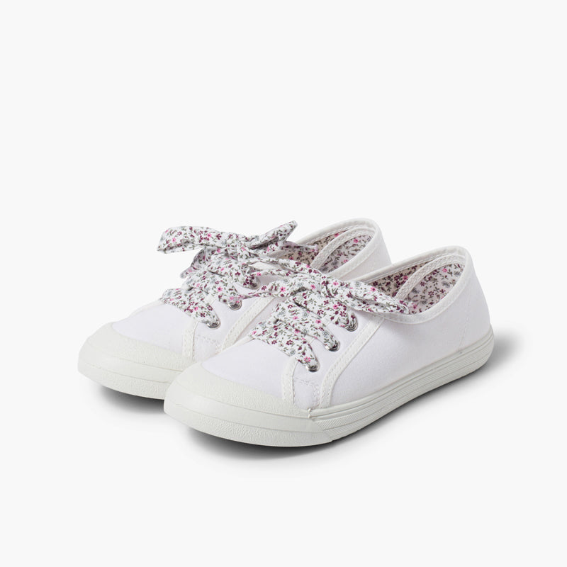 Zapatillas de lona con punta de goma color blanco