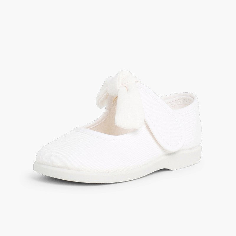 Mercedita niña con cinta adhesiva tipo angelito color blanco