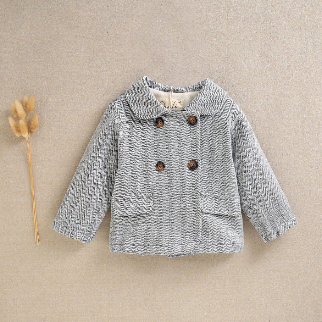 Abrigo de bebé gris con estampado de espiga