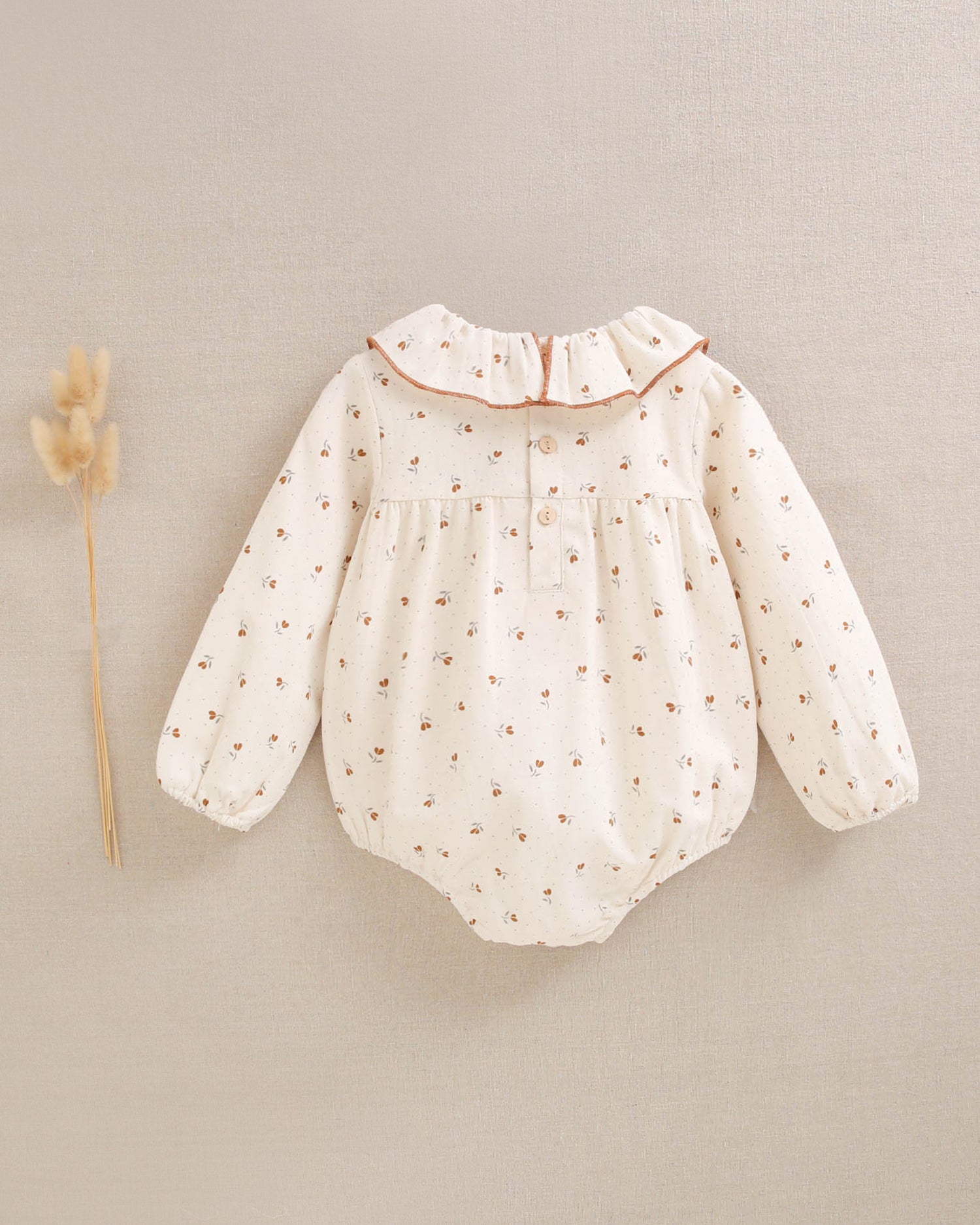 Ranita de bebé niña beige con estampado de flores