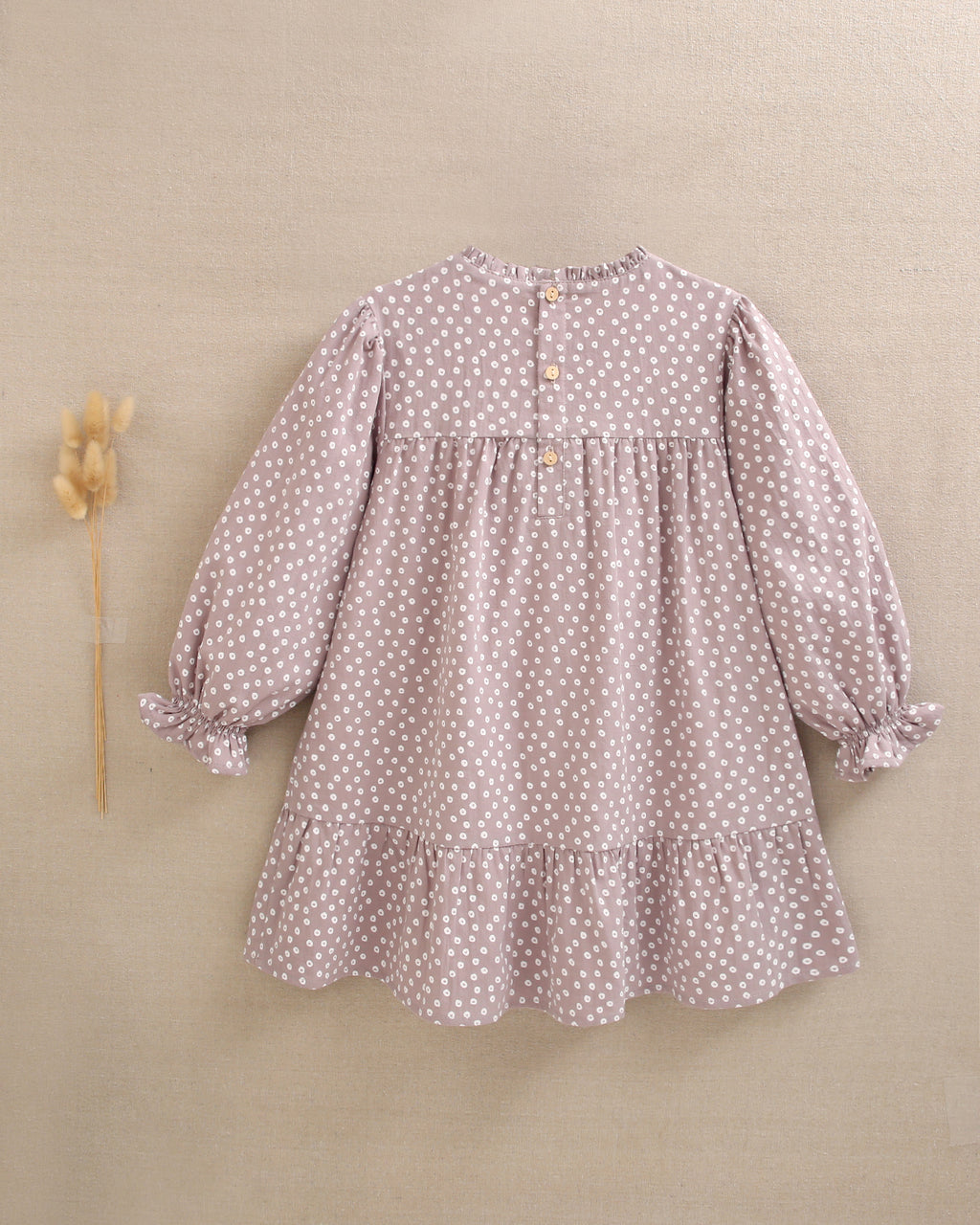 Vestido de niña malva con estampado geométrico