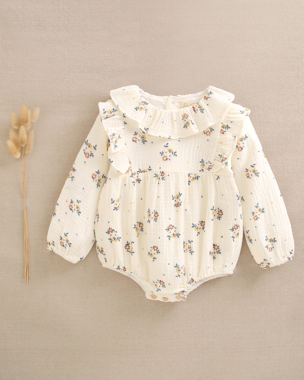Ranita de bebé niña beige con estampado de flores