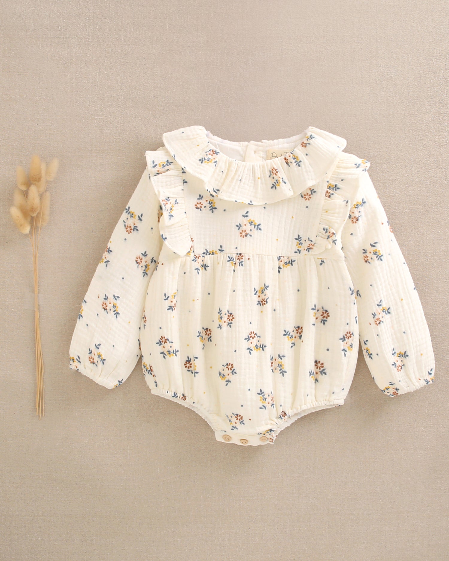 Ranita de bebé niña beige con estampado de flores