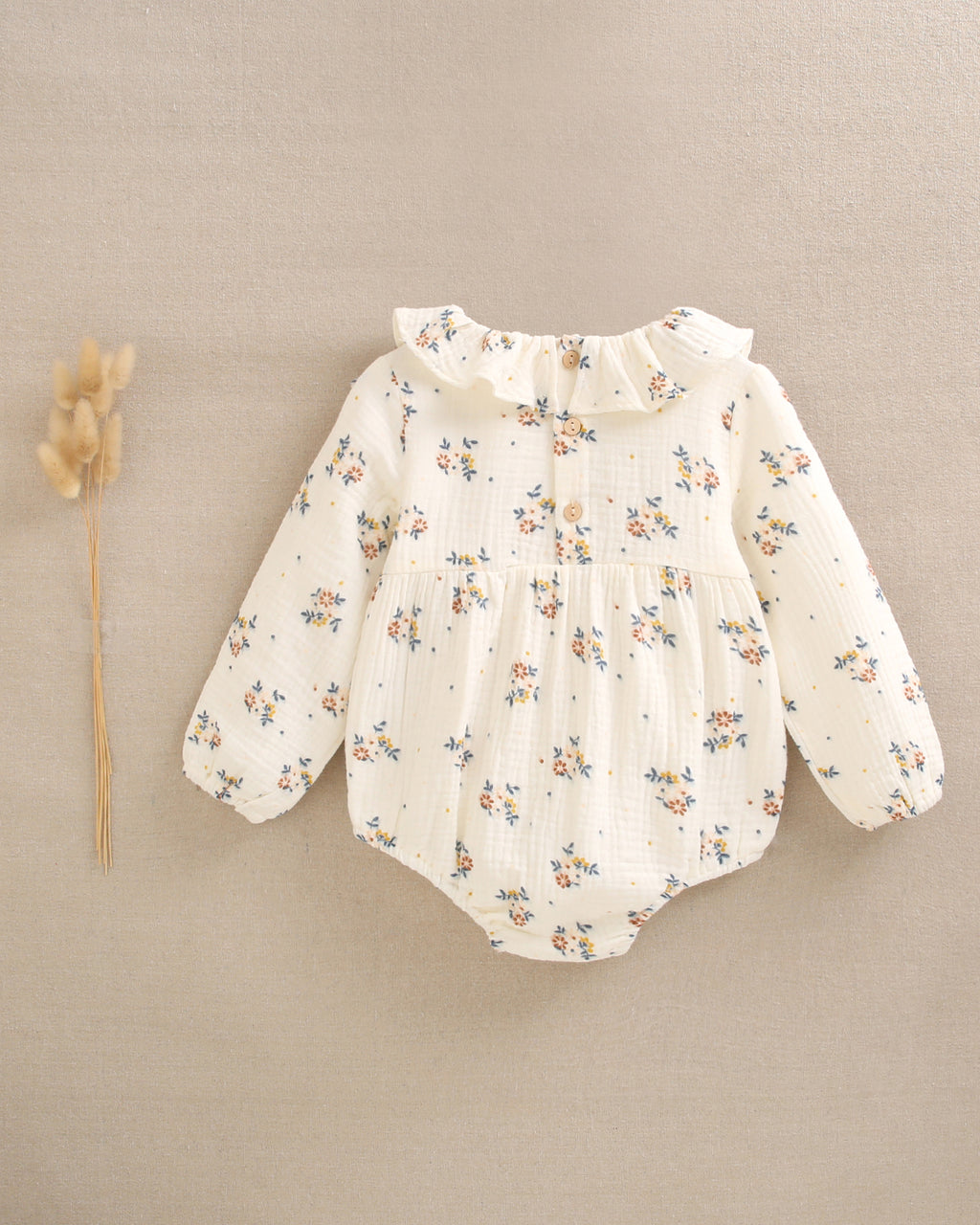Ranita de bebé niña beige con estampado de flores