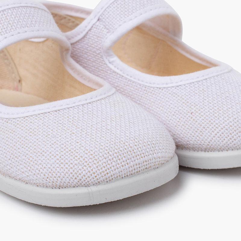 Mercedita niña de lino con botón color blanco