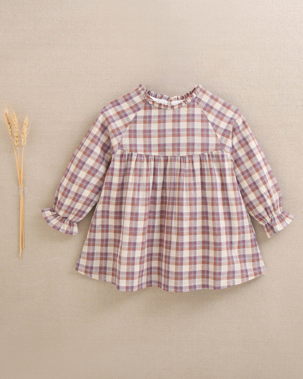 Vestido de bebé niña de cuadros en beige, morado y teja