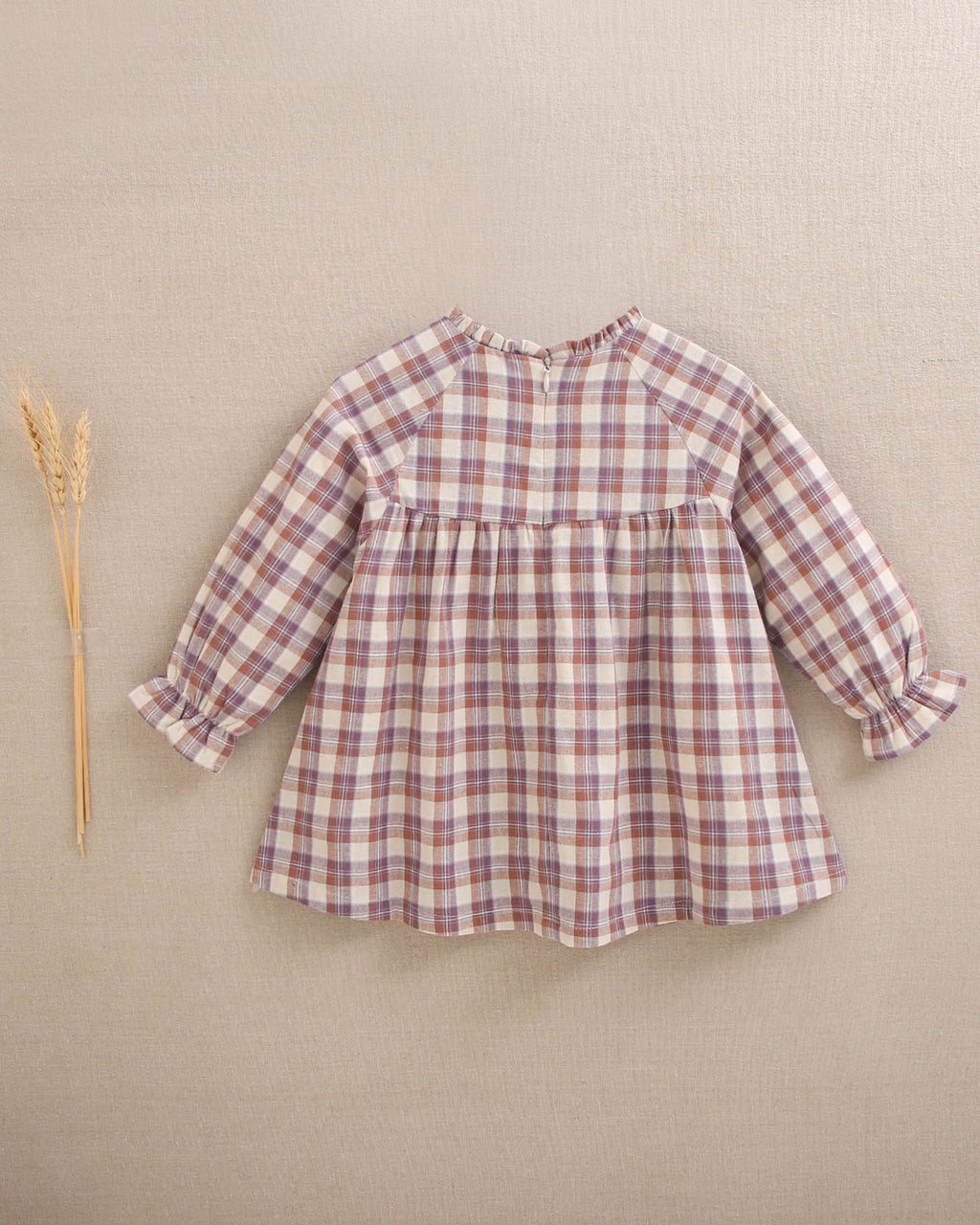 Vestido de bebé niña de cuadros en beige, morado y teja
