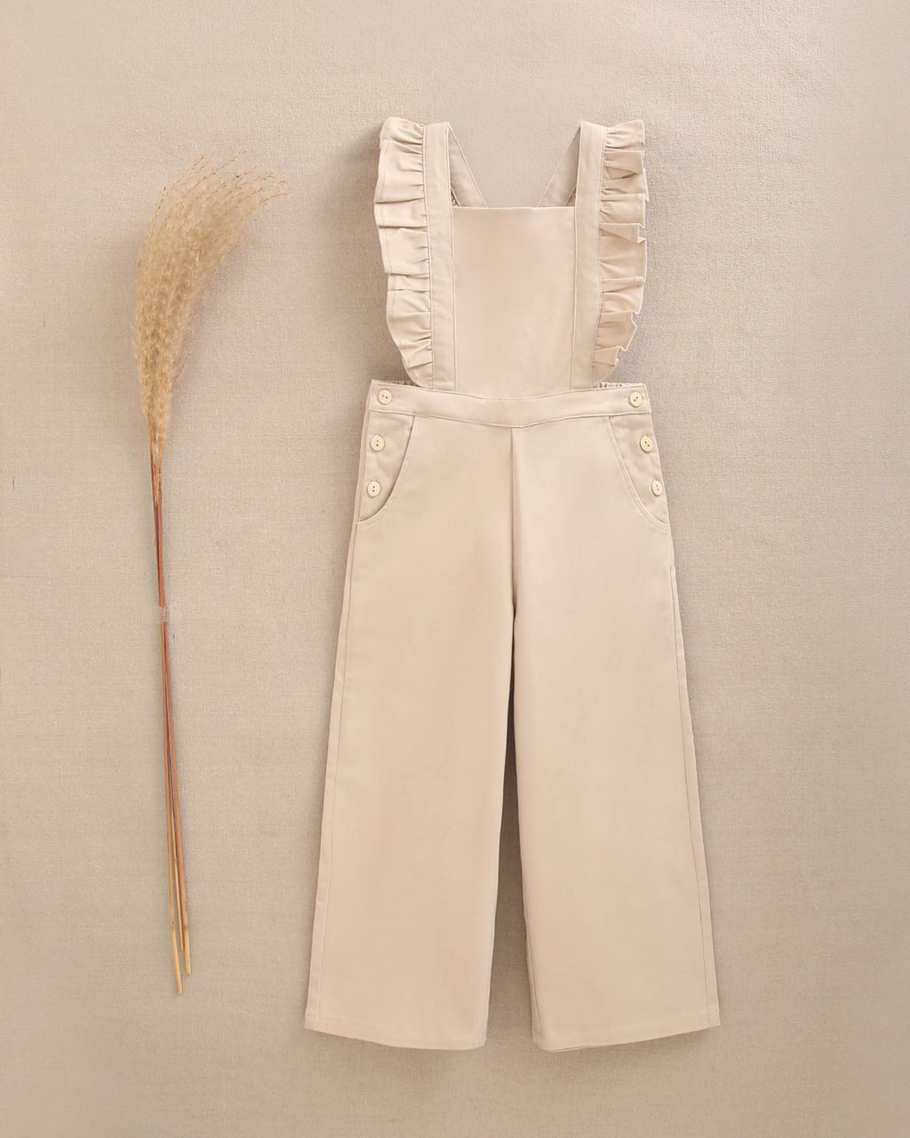 Jardinera de niña largo en beige con volantes