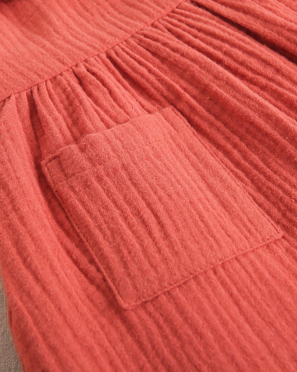 Vestido de bebé niña de muselina teja con cuello de cuadros