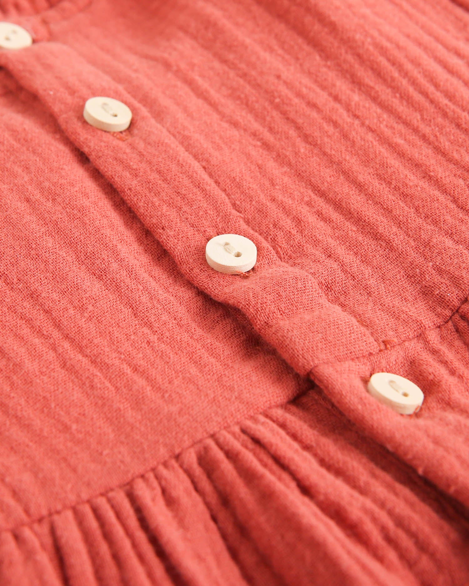 Vestido de bebé niña de muselina teja con cuello de cuadros