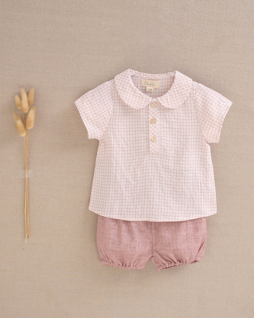 Conjunto bebé niño camisa de cuadro rosa y blanco, y short rosa palo lavado