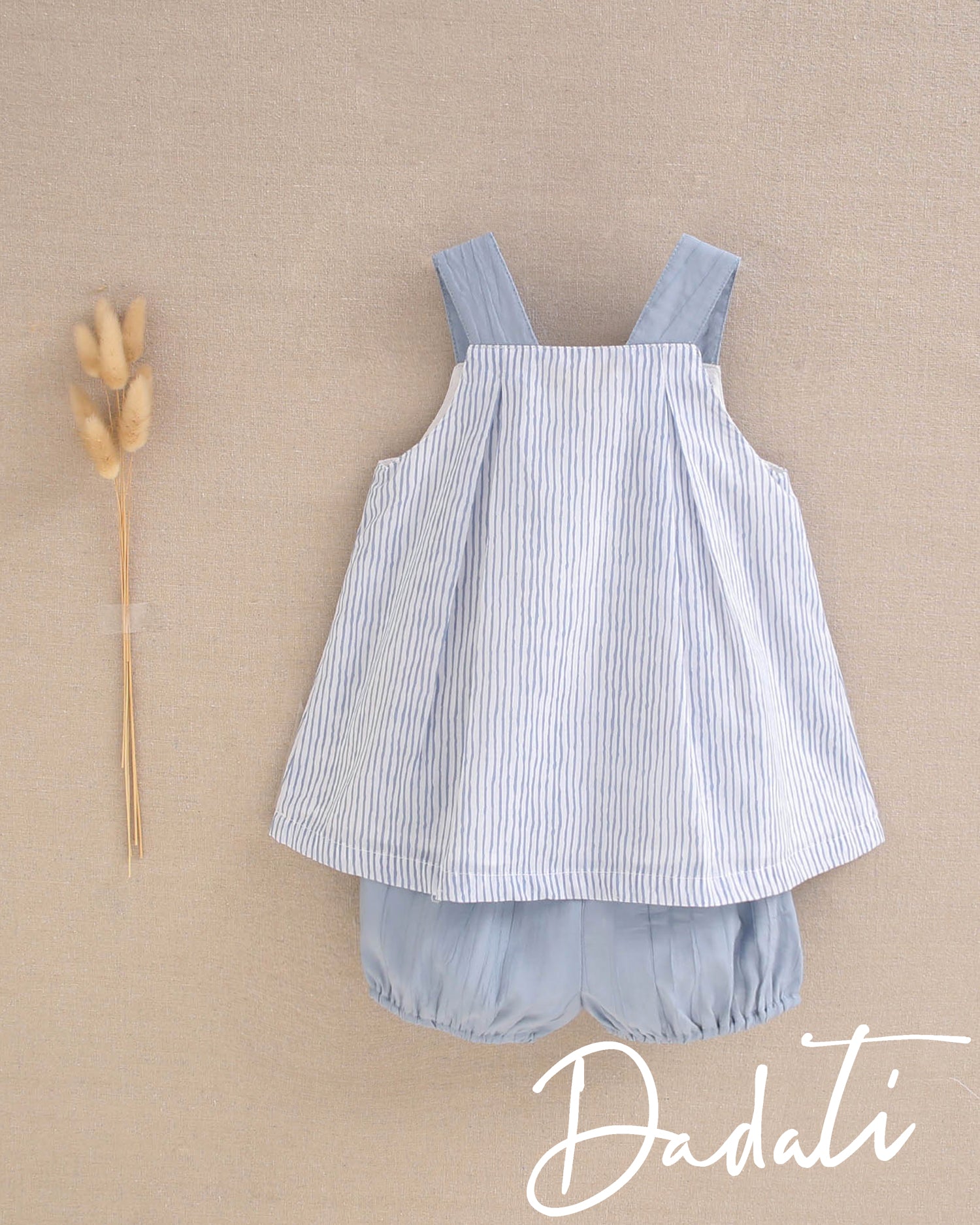 Set bebé niña celeste con rayitas