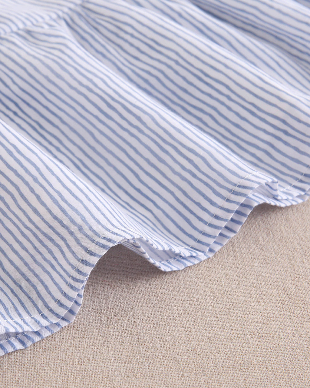 Vestido niña de tirantes con rayas blancas y azul pastel