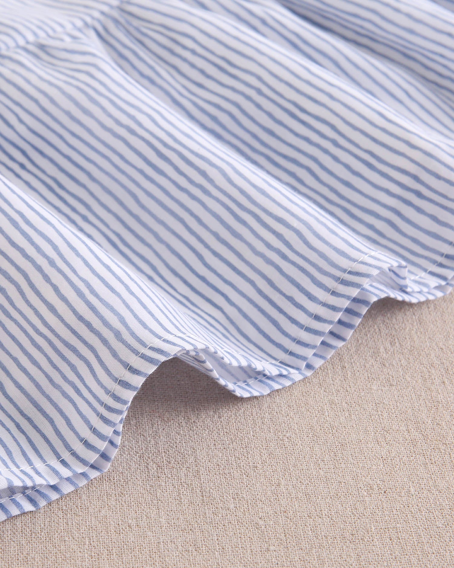 Vestido niña de tirantes con rayas blancas y azul pastel