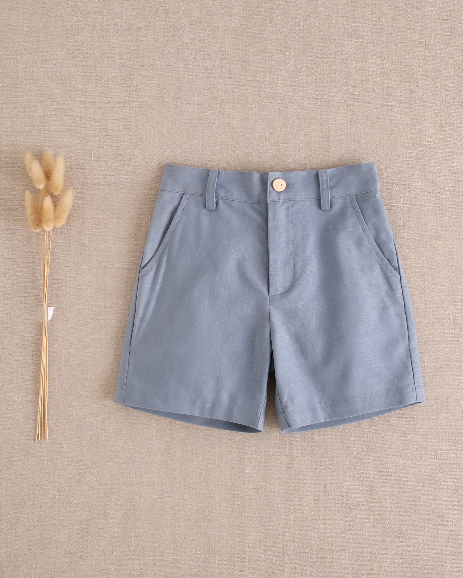 Bermuda niño de lino azul pastel oscuro
