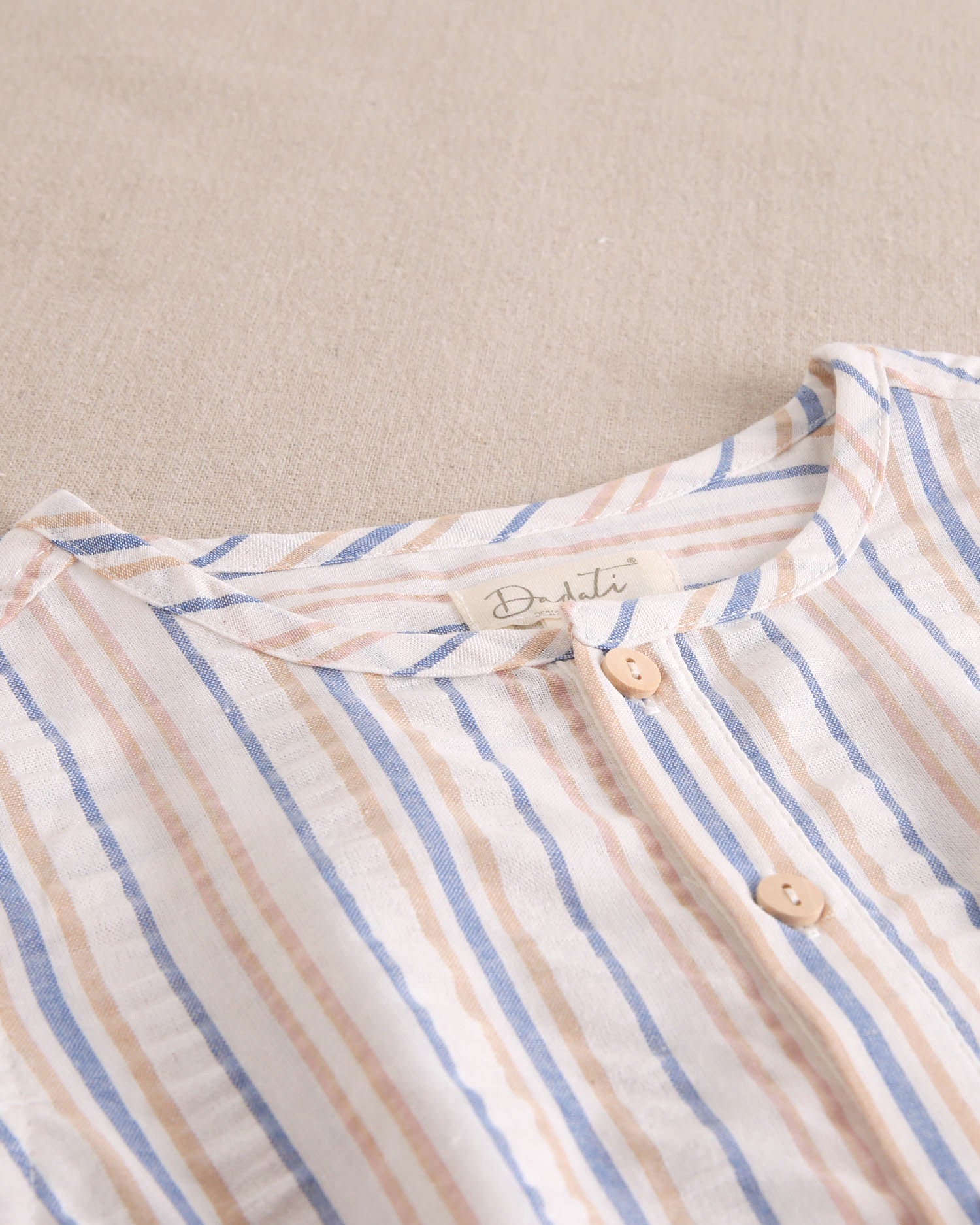 Camisa niño de rayas mostaza y azul