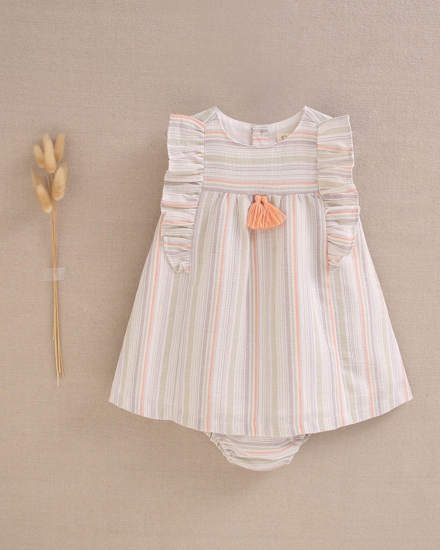 Vestido bebé niña rayas naranja, gris y verde, con borla naranja flúor