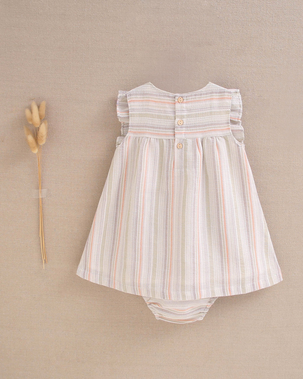 Vestido bebé niña rayas naranja, gris y verde, con borla naranja flúor