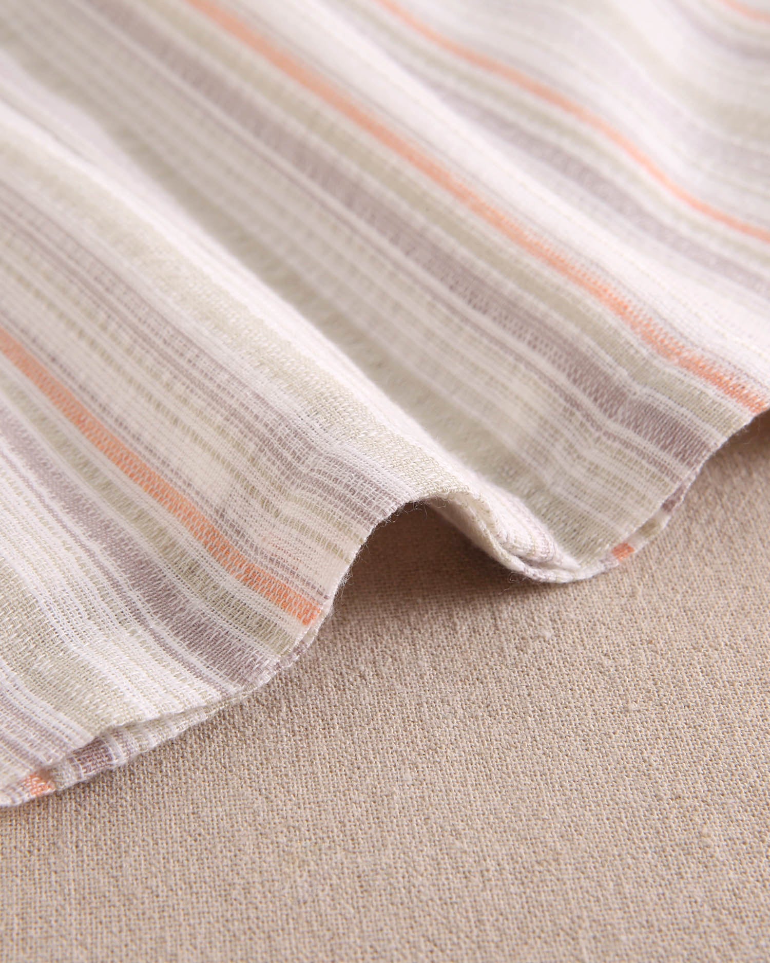 Vestido bebé niña rayas naranja, gris y verde, con borla naranja flúor