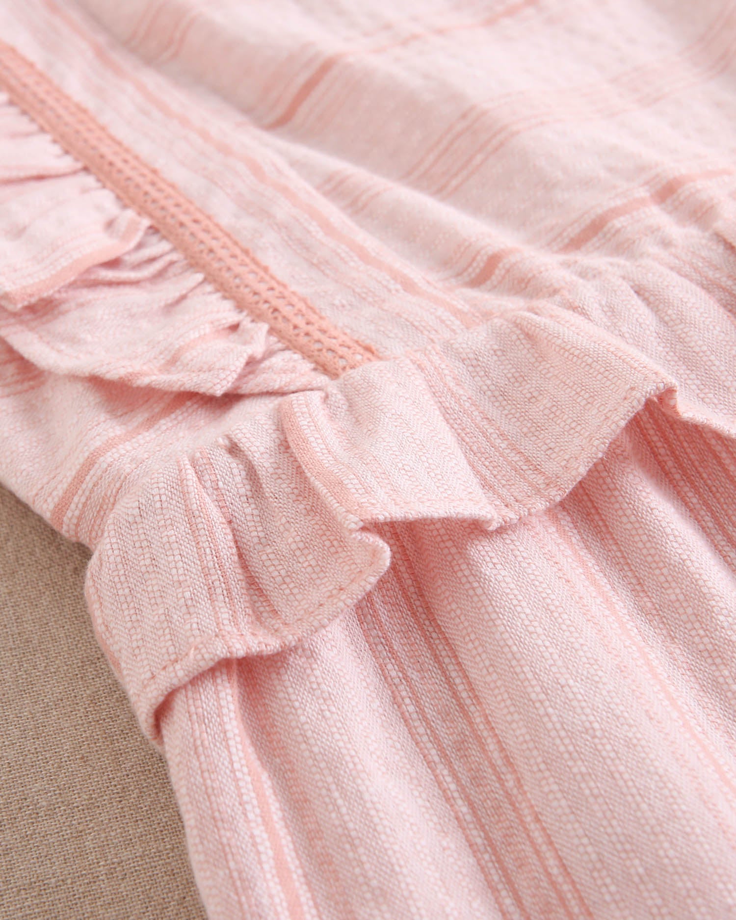 Enterito niña naranja de rayas con volantes en tirantes