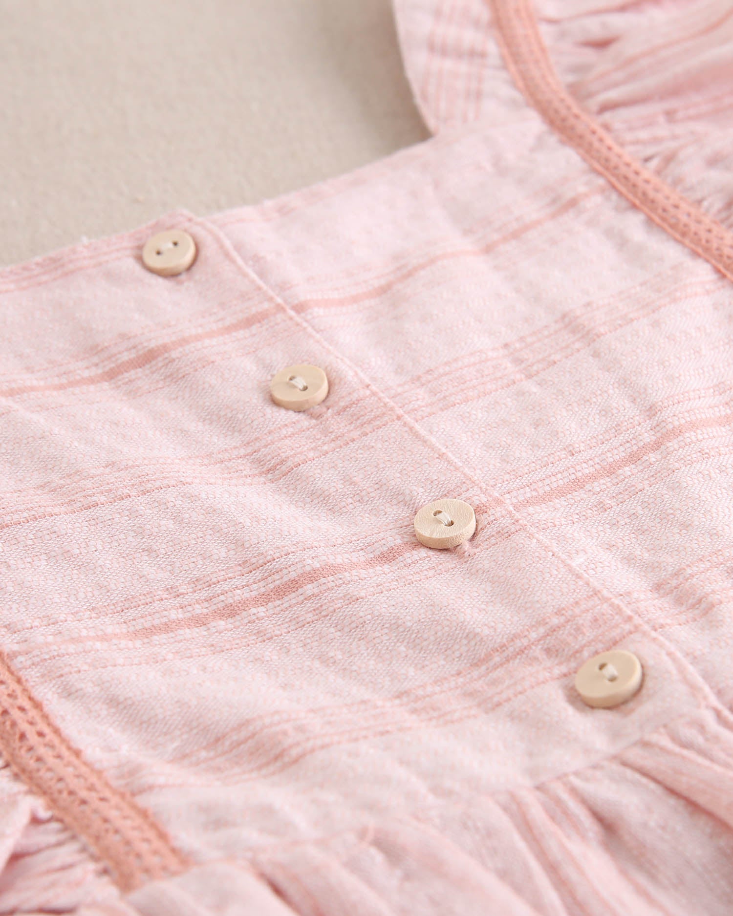 Enterito niña naranja de rayas con volantes en tirantes