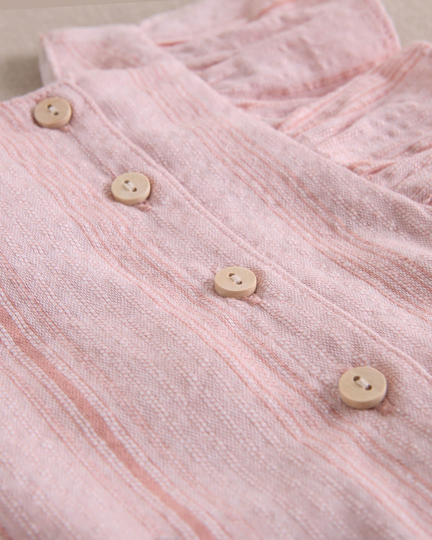 Vestido niña rosa con rayas, tirante volante y lazo