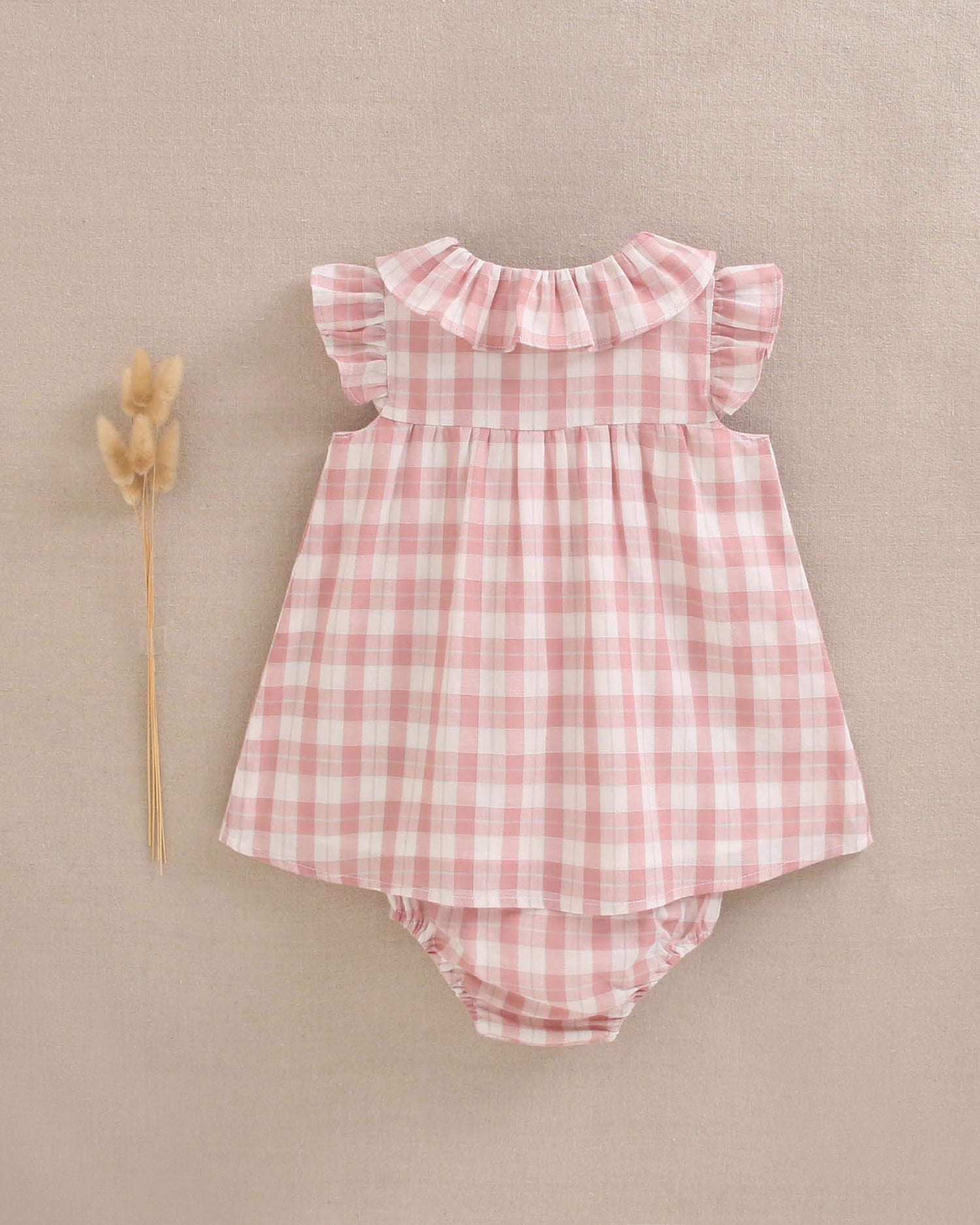Vestido bebé niña de cuadro vichy rosa con bolsillos