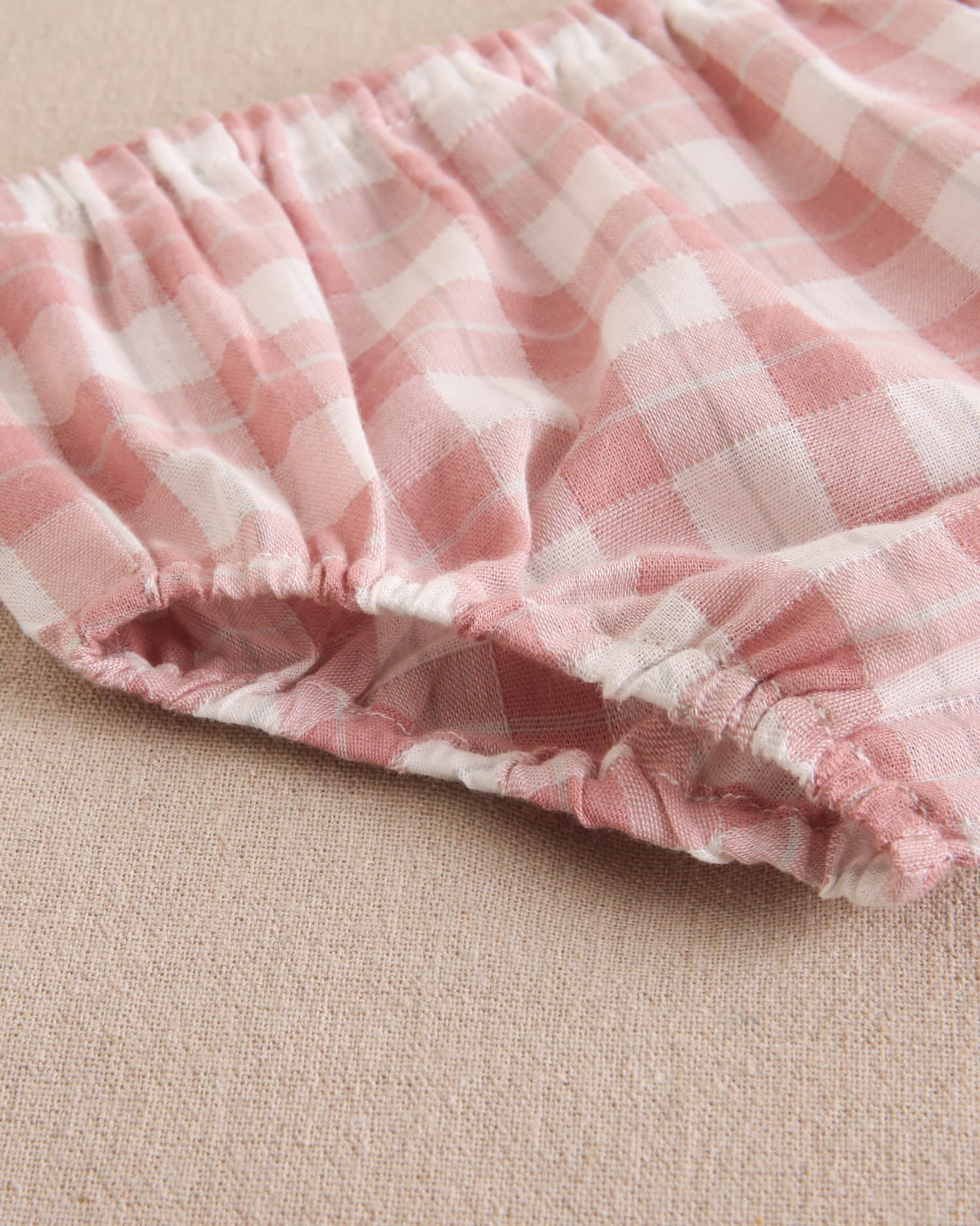 Vestido bebé niña de cuadro vichy rosa con bolsillos