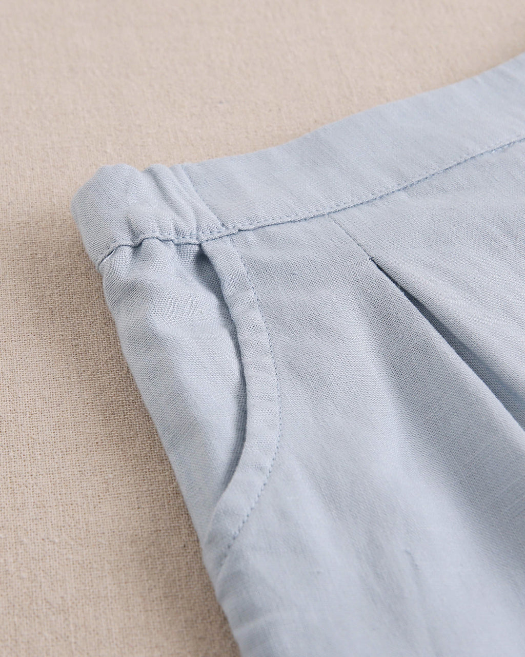 Short niña azul con volantes en bajo