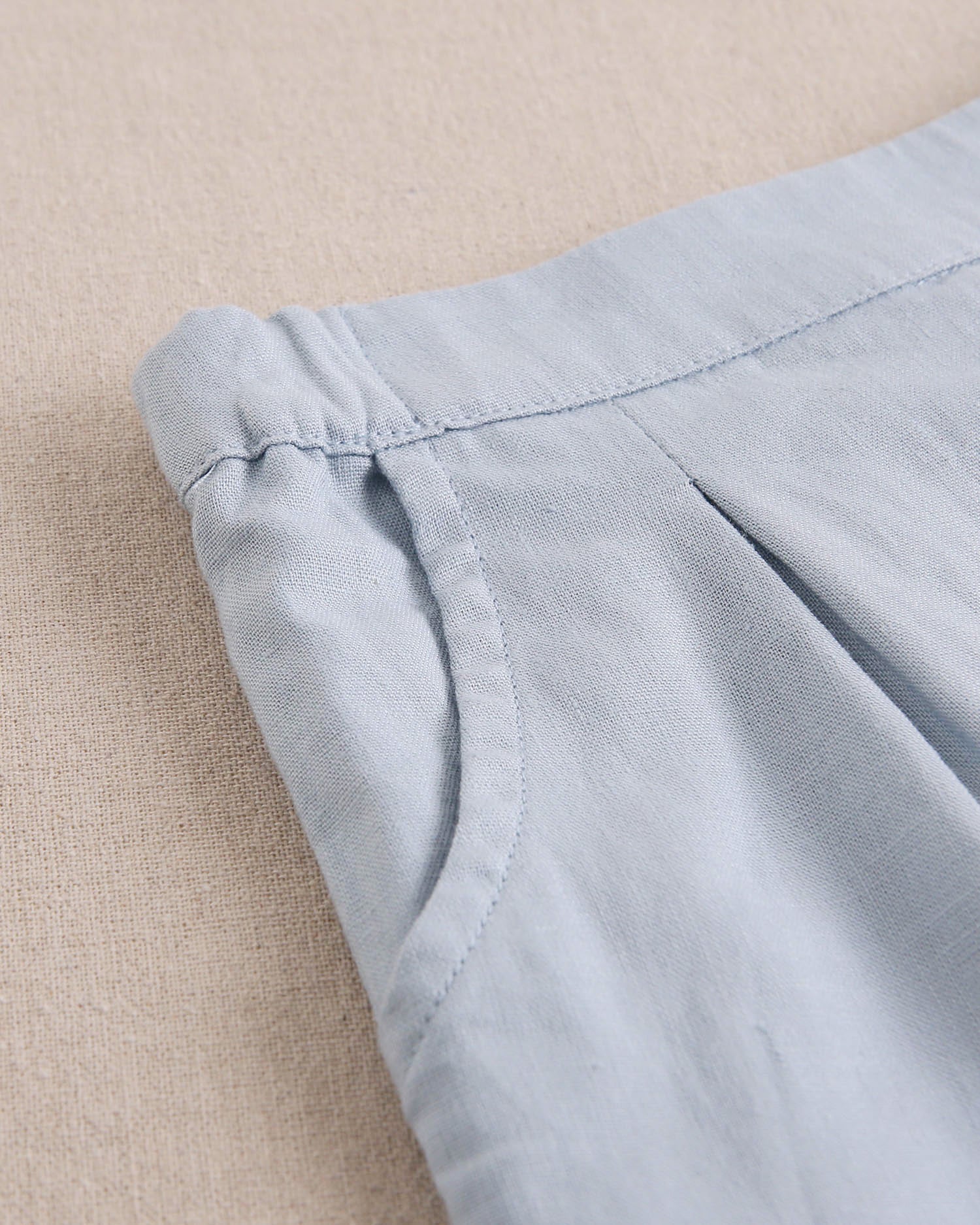 Short niña azul con volantes en bajo