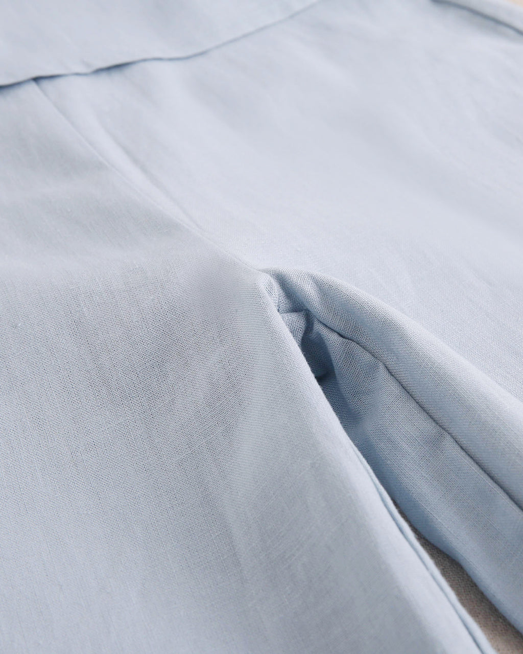 Enterito niña azul con cuello halter y nudo