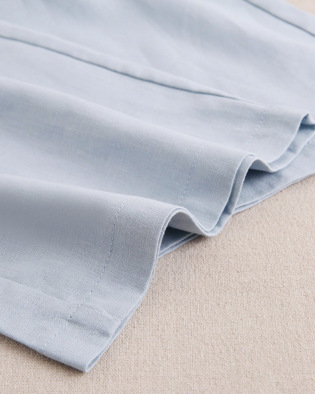 Enterito niña azul con cuello halter y nudo