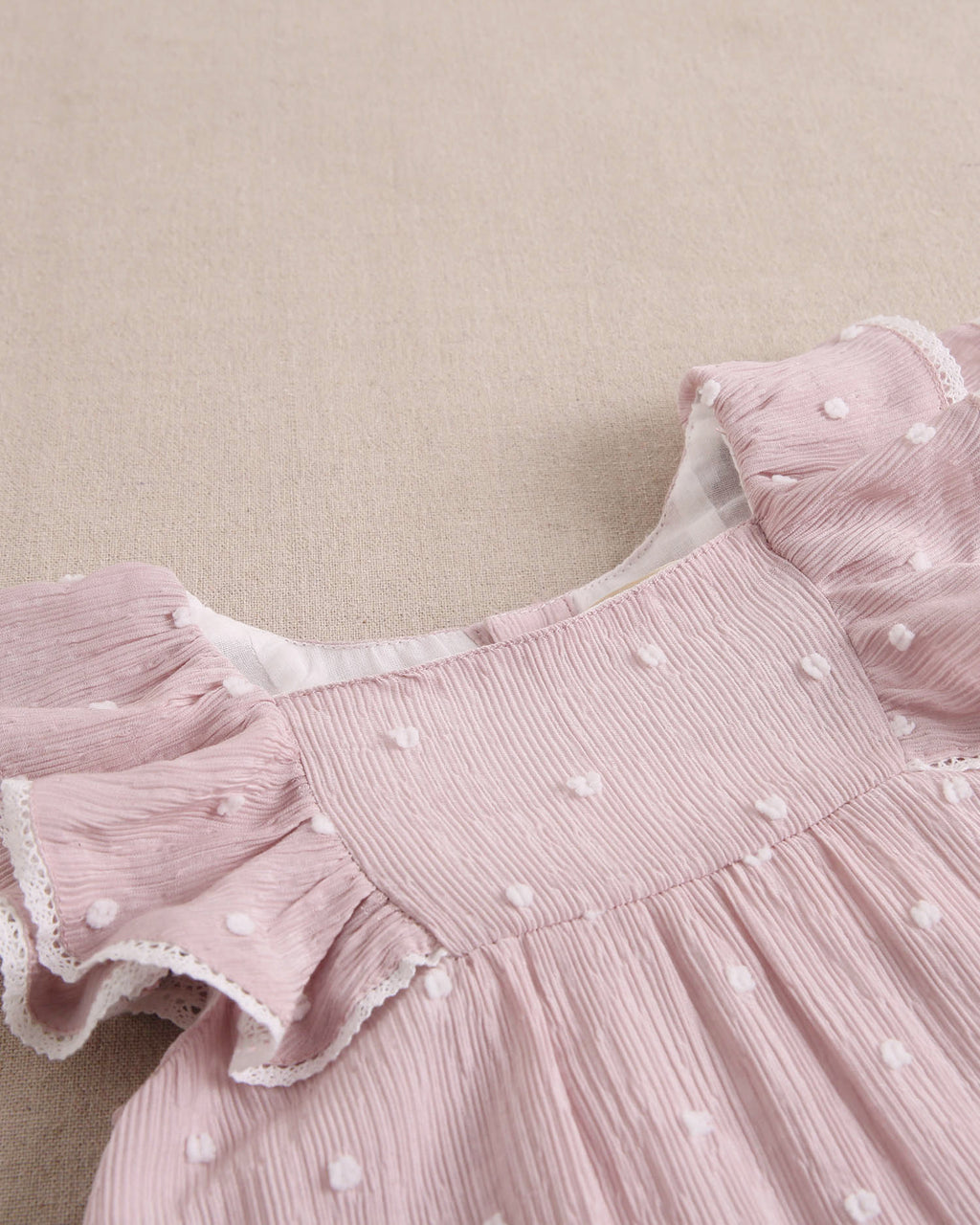 Vestido bebé niña plumeti rosa con mini topitos