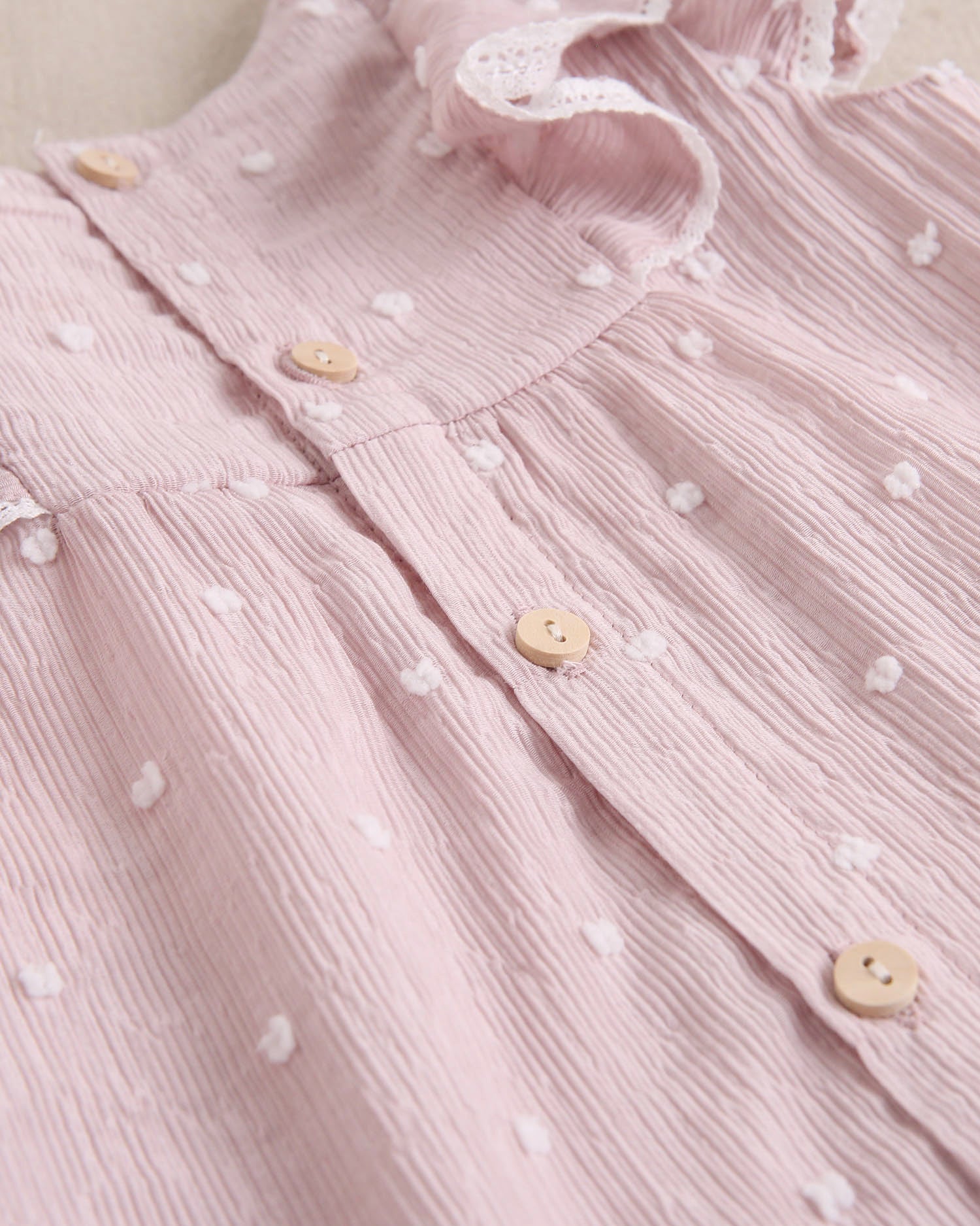 Vestido bebé niña plumeti rosa con mini topitos