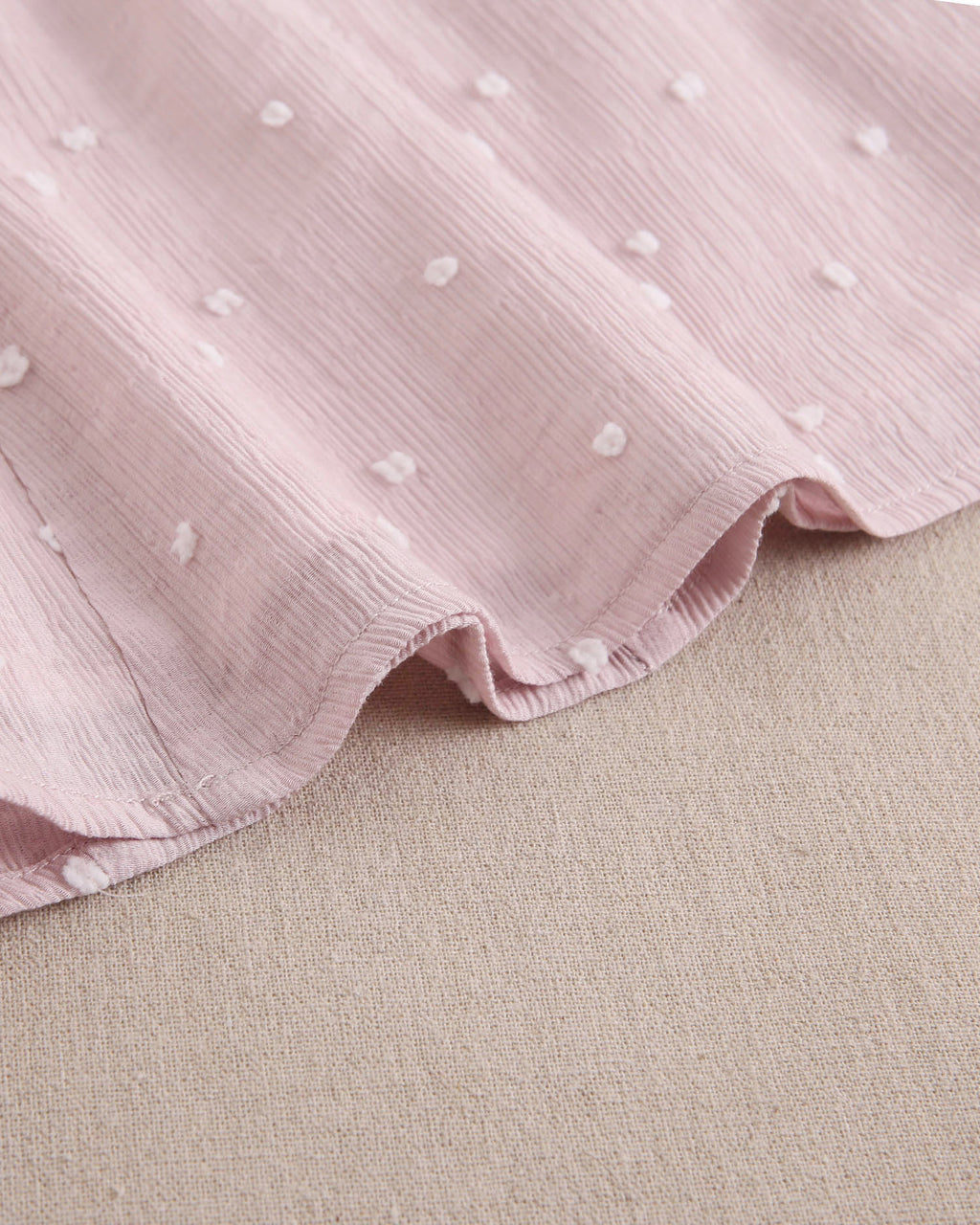 Vestido niña de plumeti rosa con mini topitos blancos y mangas volante