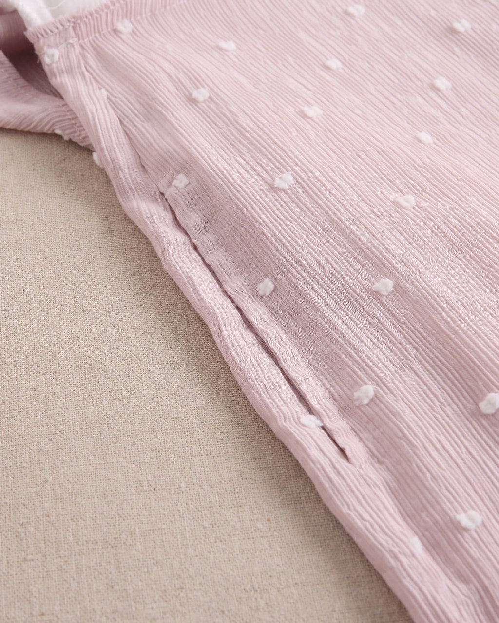 Enterito niña largo color rosa con mini topitos blancos