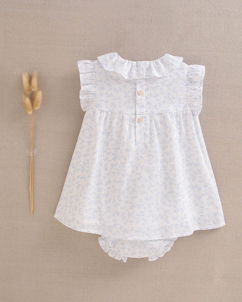 Vestido bebé niña blanco con flores celestes