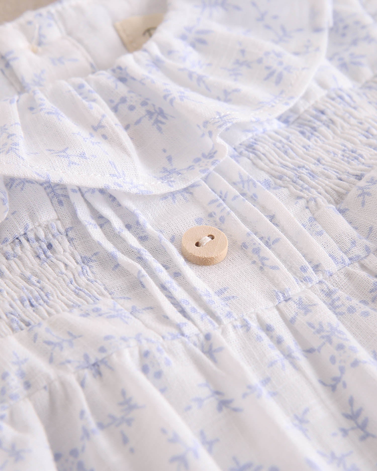 Vestido bebé niña blanco con flores celestes