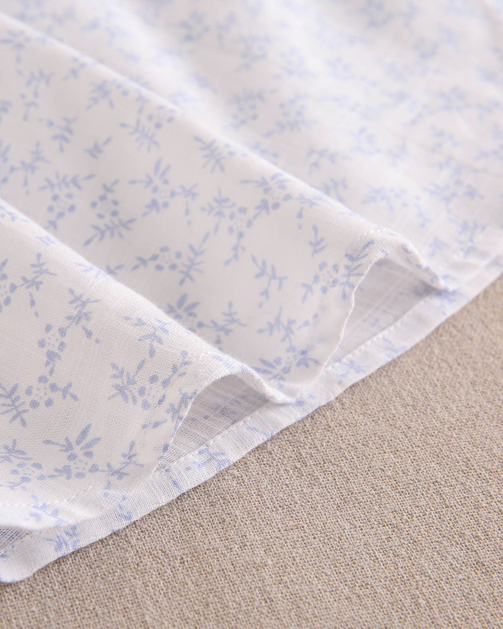 Vestido bebé niña blanco con flores celestes