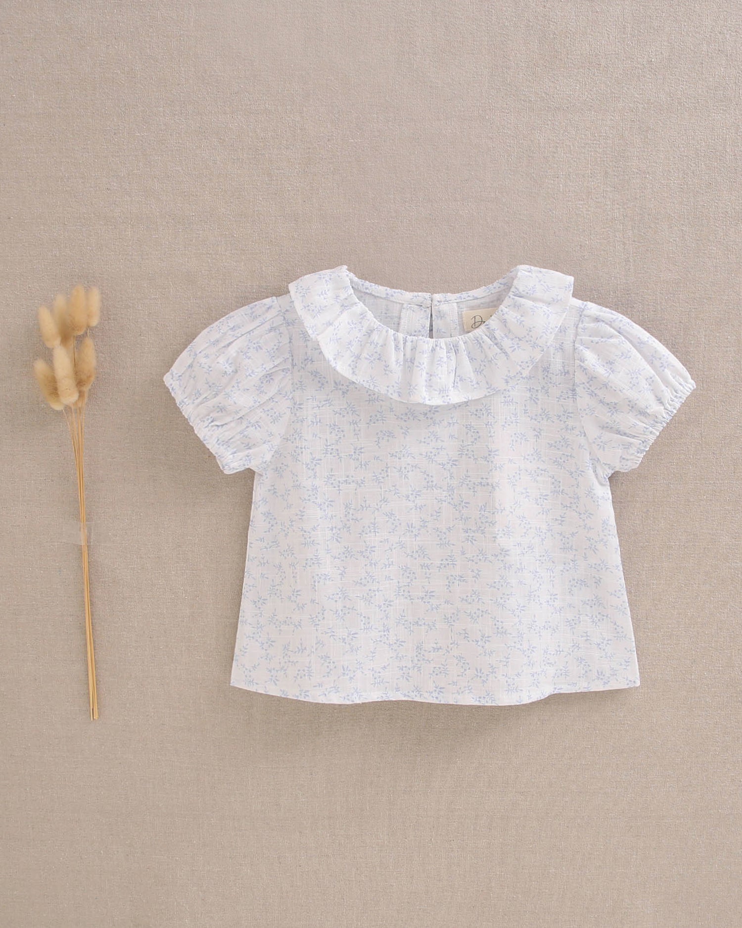 Blusa bebé niña con detalles azules