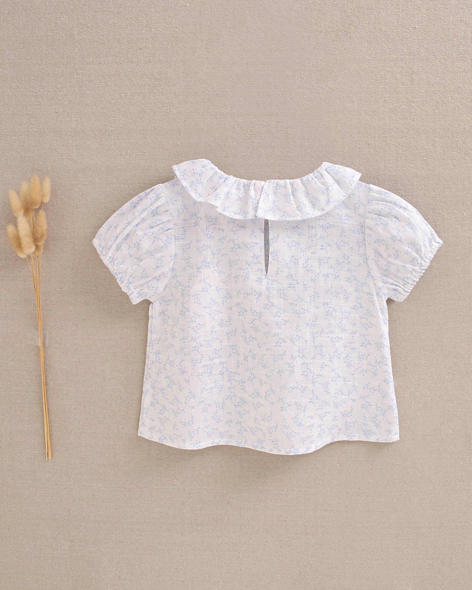 Blusa bebé niña con detalles azules