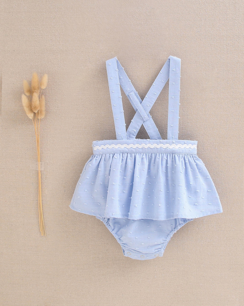 Ranita bebé niña tipo pichi de plumeti azul con ribete blanco