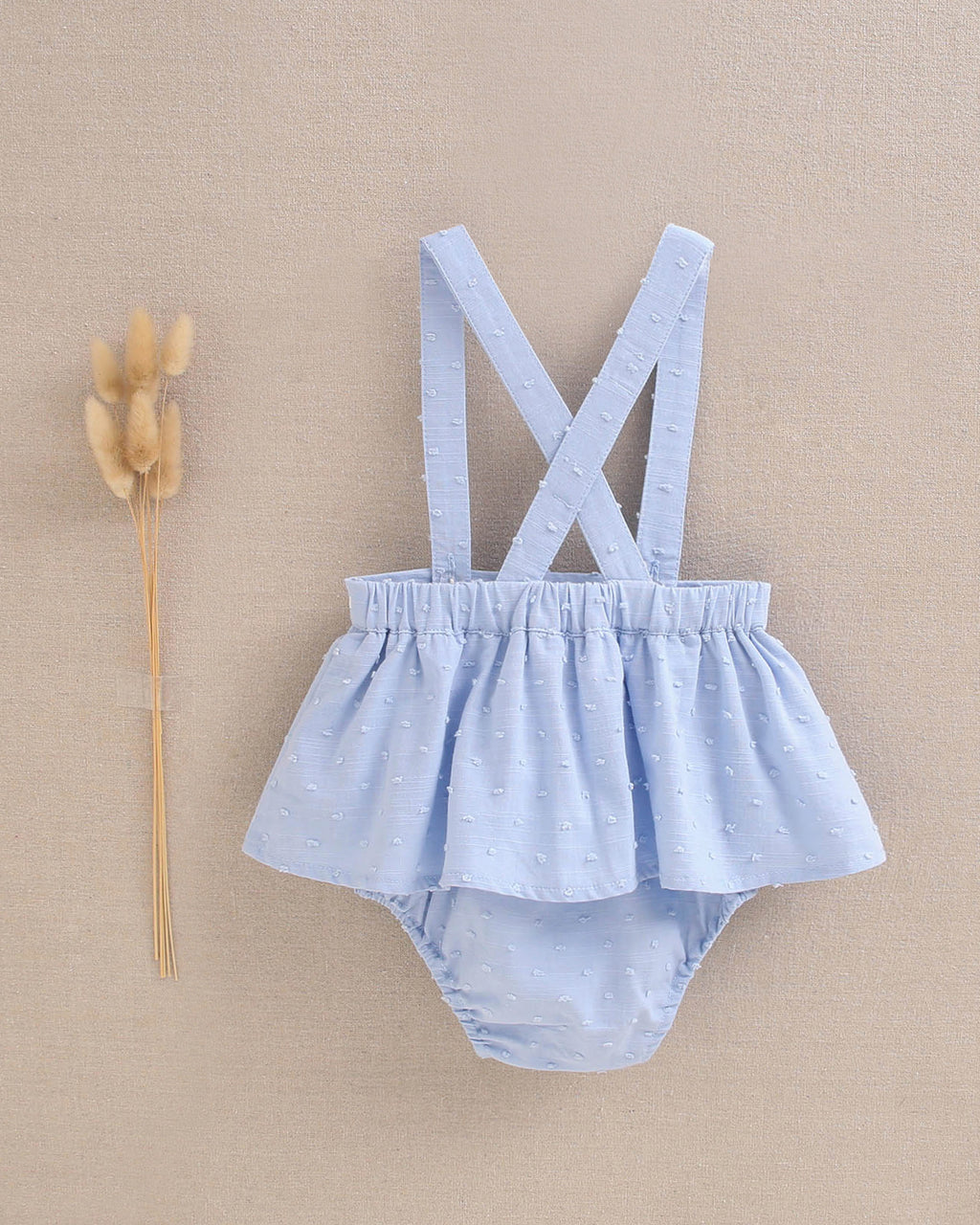 Ranita bebé niña tipo pichi de plumeti azul con ribete blanco