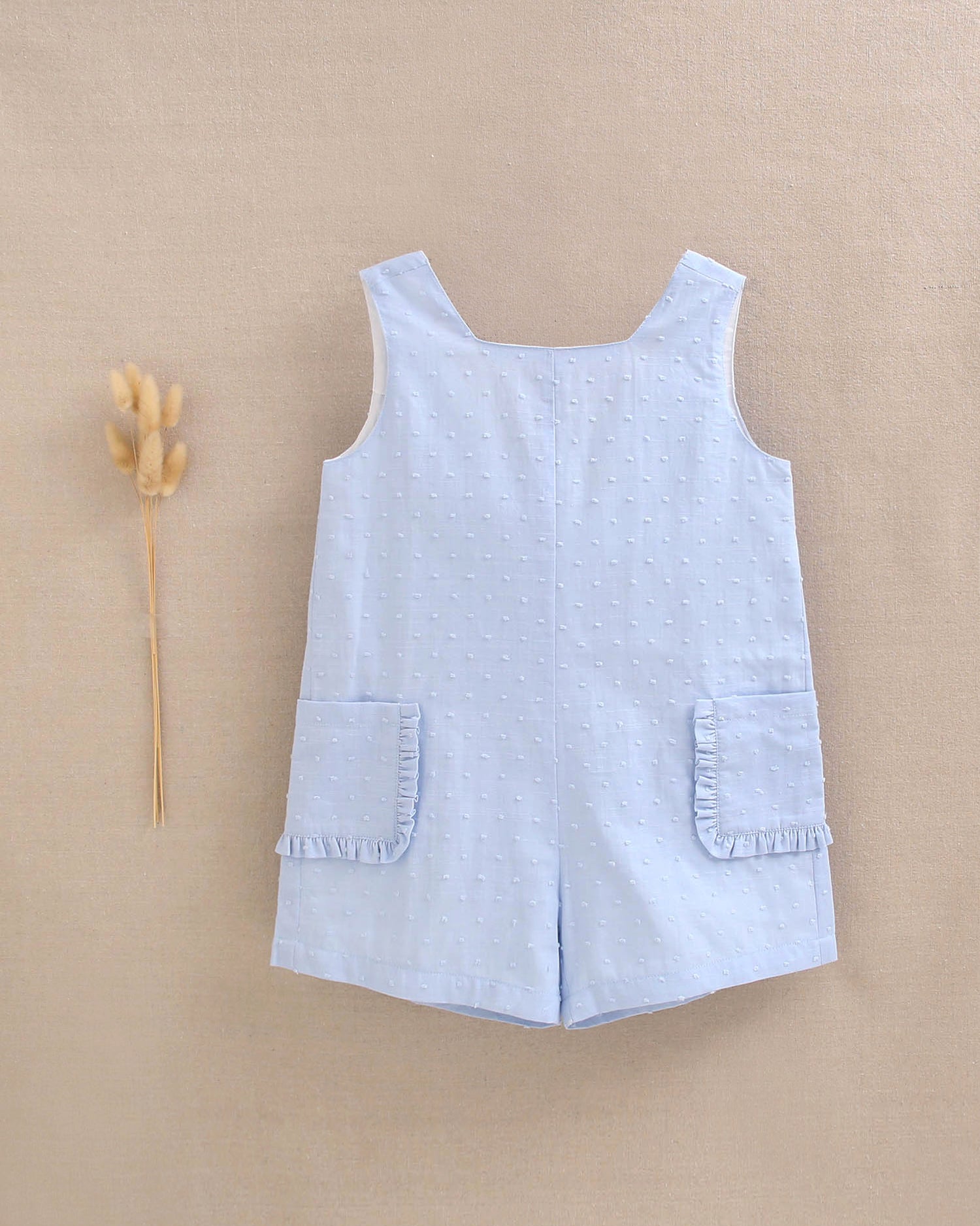 Enterito niña corto de plumeti azul con maxi lazo