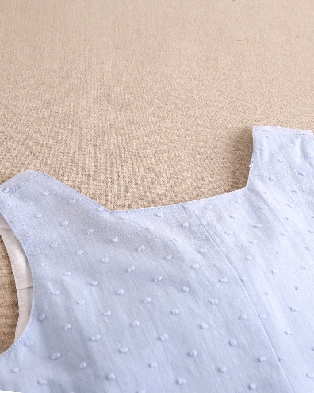 Enterito niña corto de plumeti azul con maxi lazo