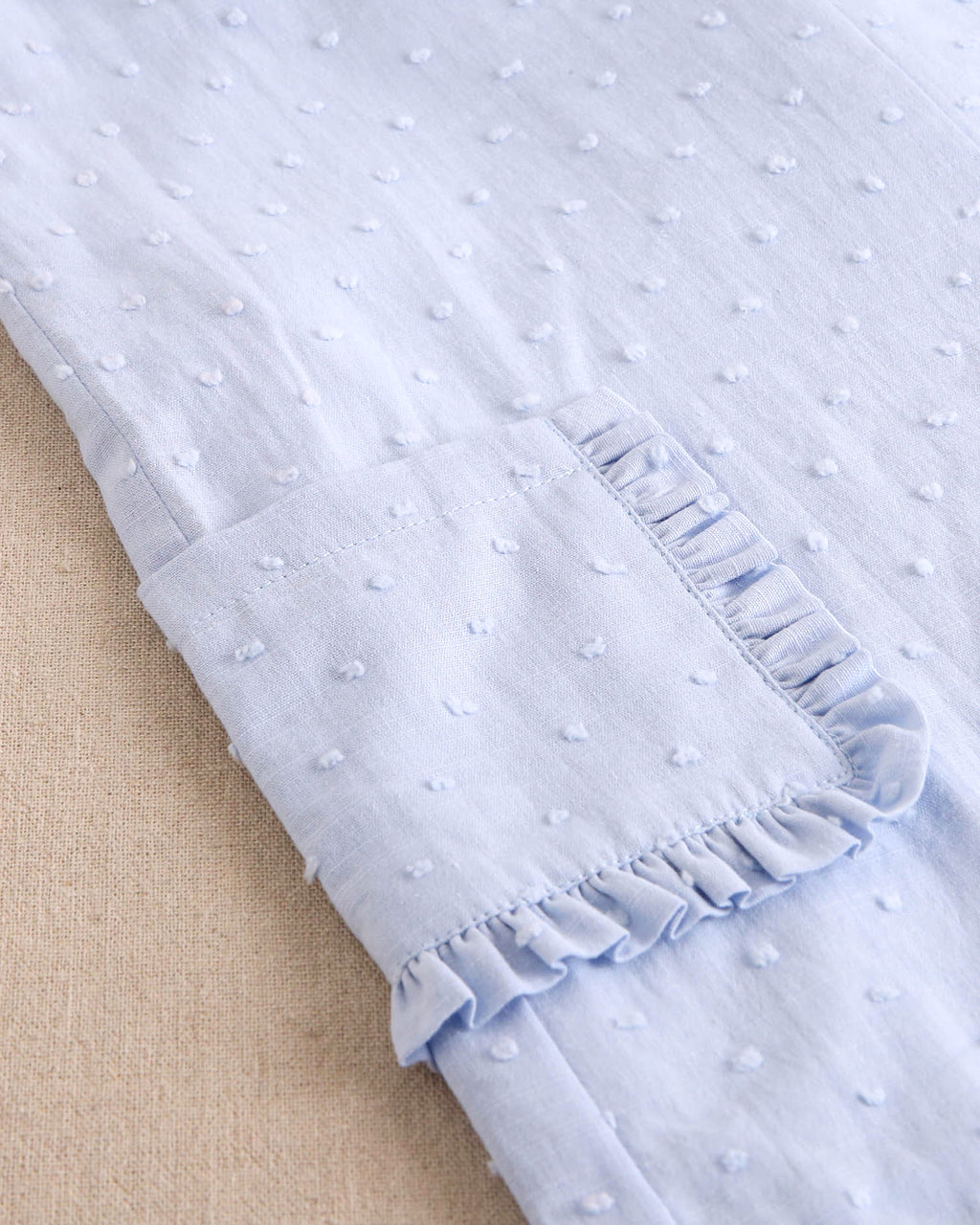 Enterito niña corto de plumeti azul con maxi lazo