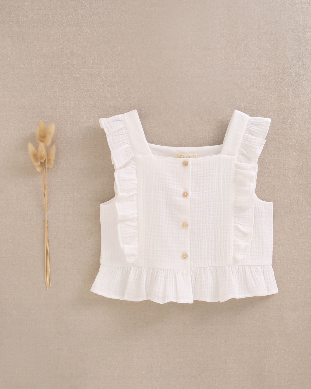 Blusa niña blanca con volantes en cuadrado