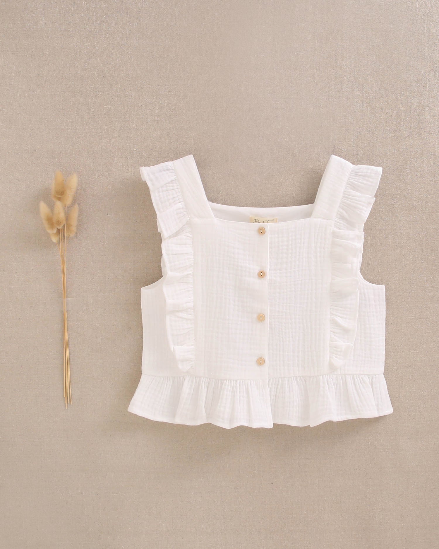 Blusa niña blanca con volantes en cuadrado