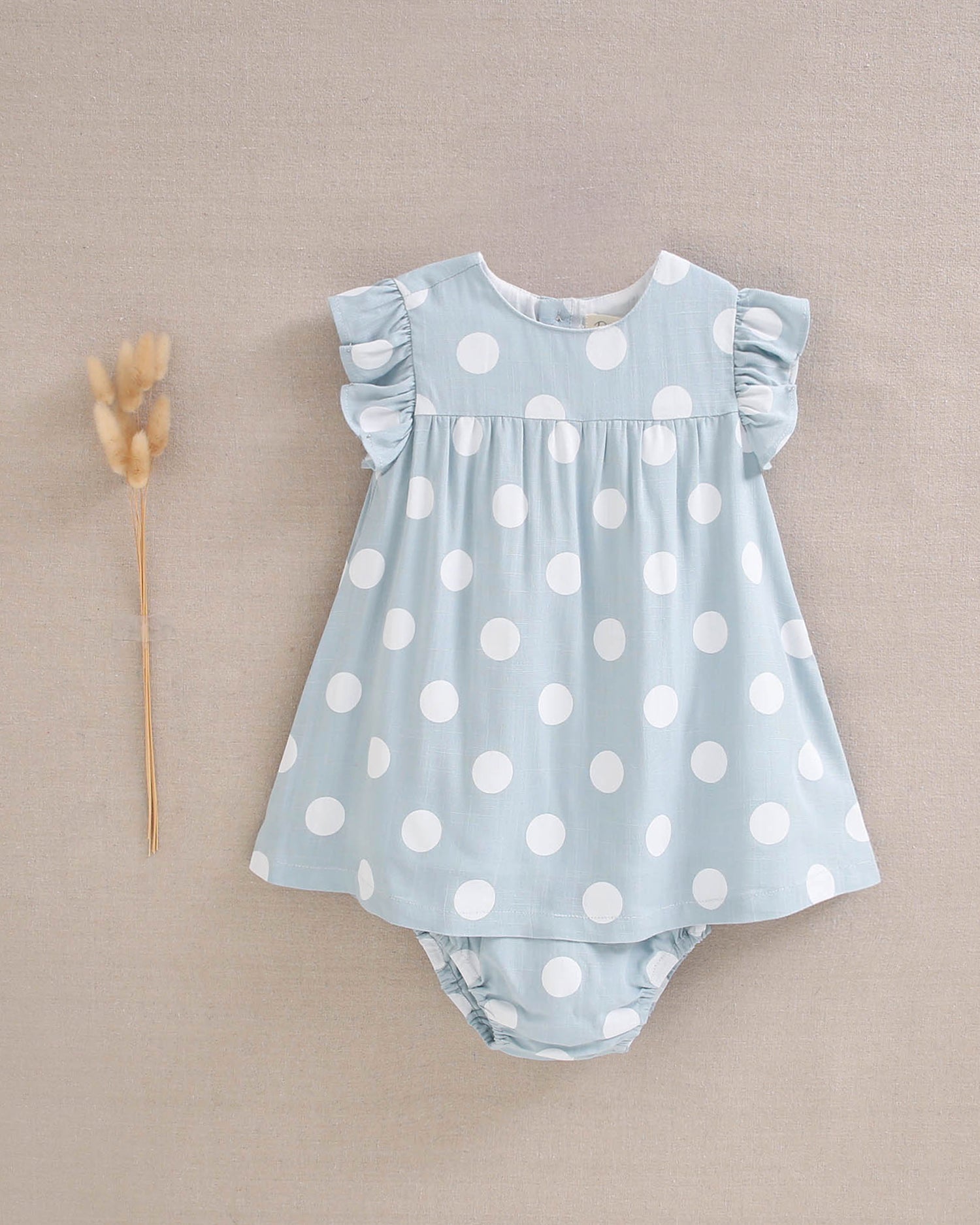 Vestido de bebé niña azul cielo con lunares blancos