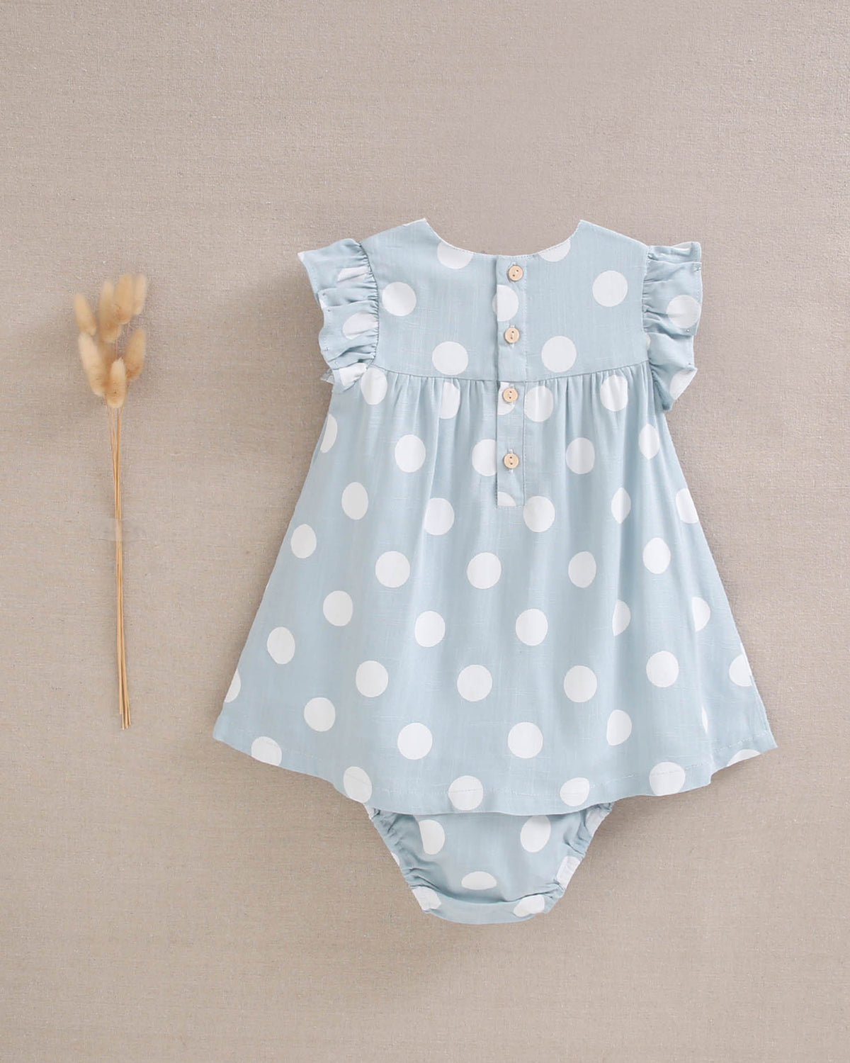 Vestido de bebé niña azul cielo con lunares blancos